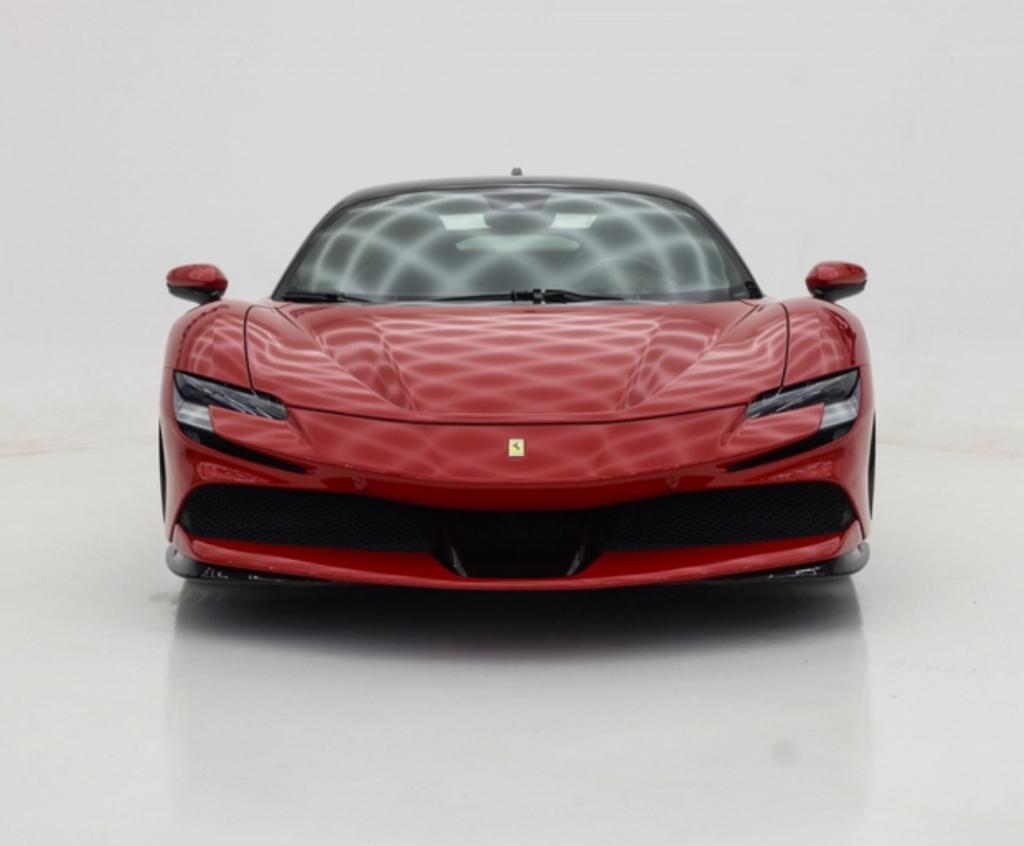 red Ferrari SF90 2024 for rent in Dubai